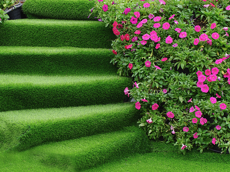 How to Use Flowers to Design Synthetic Grass in Houston TX