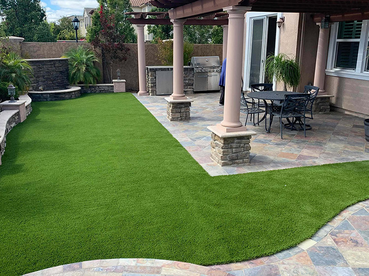 The Benefits of Using Artificial Grass in Shaded Outdoor Living Areas